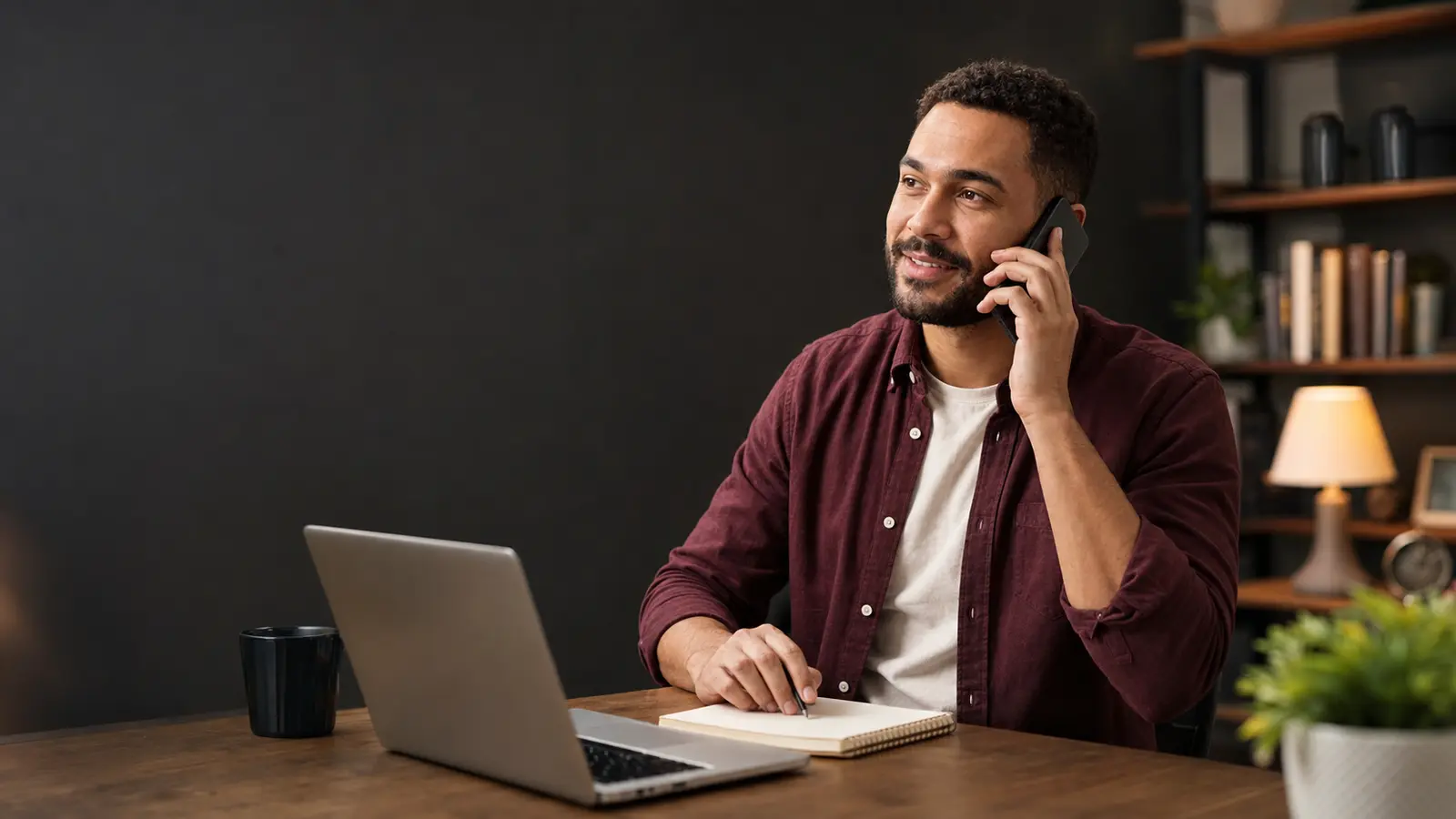 A trusted technology consultant listening to a client by phone