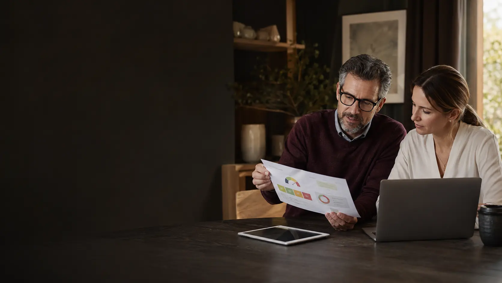 A client and technology advisor reviewing a clear technology report