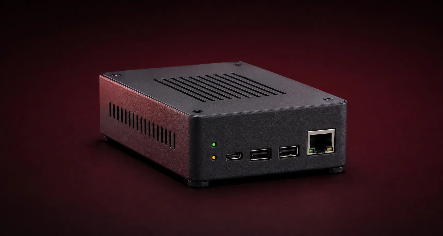 Representative compact Sentinel monitoring hardware in a dark enclosure