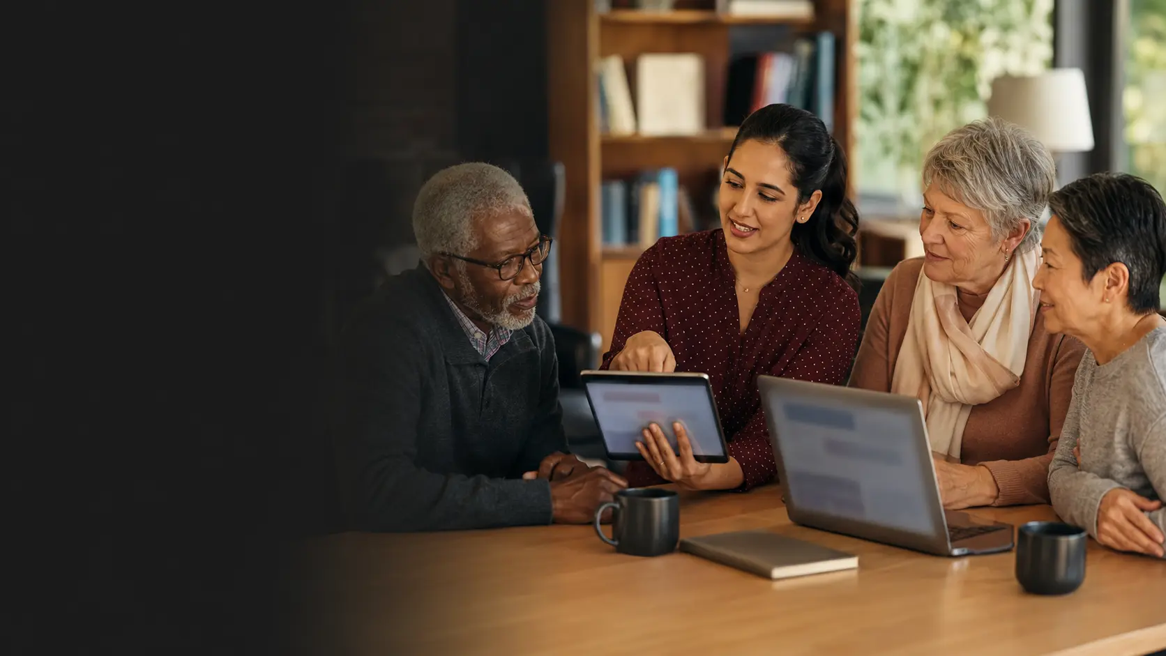A friendly small-group technology learning session with older adults